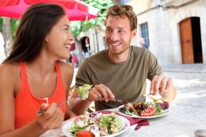 Restaurant tourists couple eating at outdoor cafe